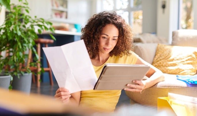 woman looking at health test results