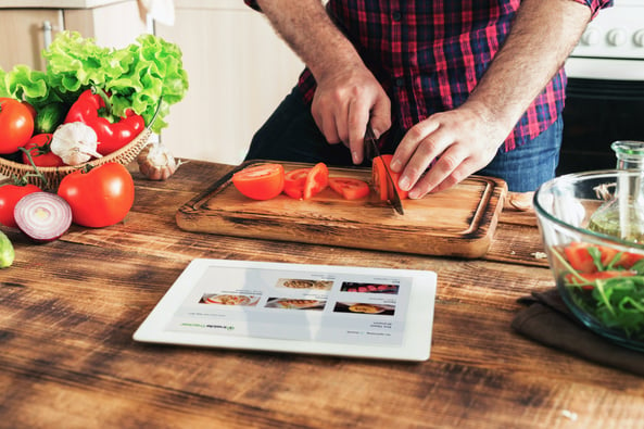 man_cooking_ipad_salad_vegetables.jpg