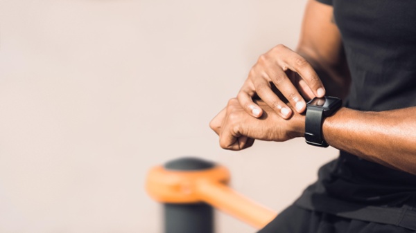 Man looking at smart watch