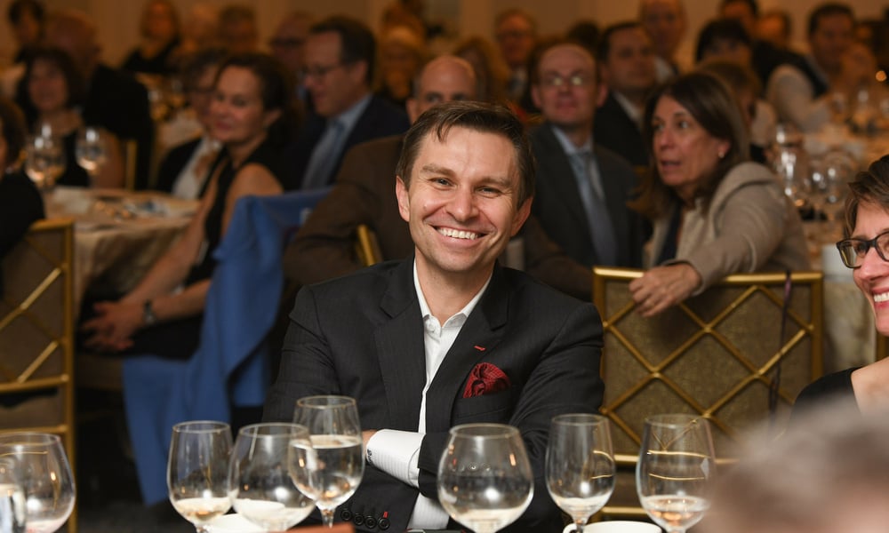 Dr. David Sinclair smiling at an award ceremony