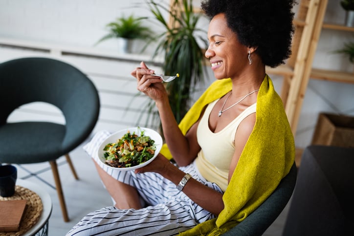 Woman eating a salad