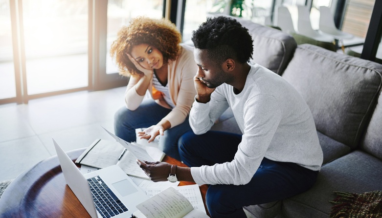 https://blog.insidetracker.com/hubfs/Stressed-couple-table-taxes-paperwork.jpg